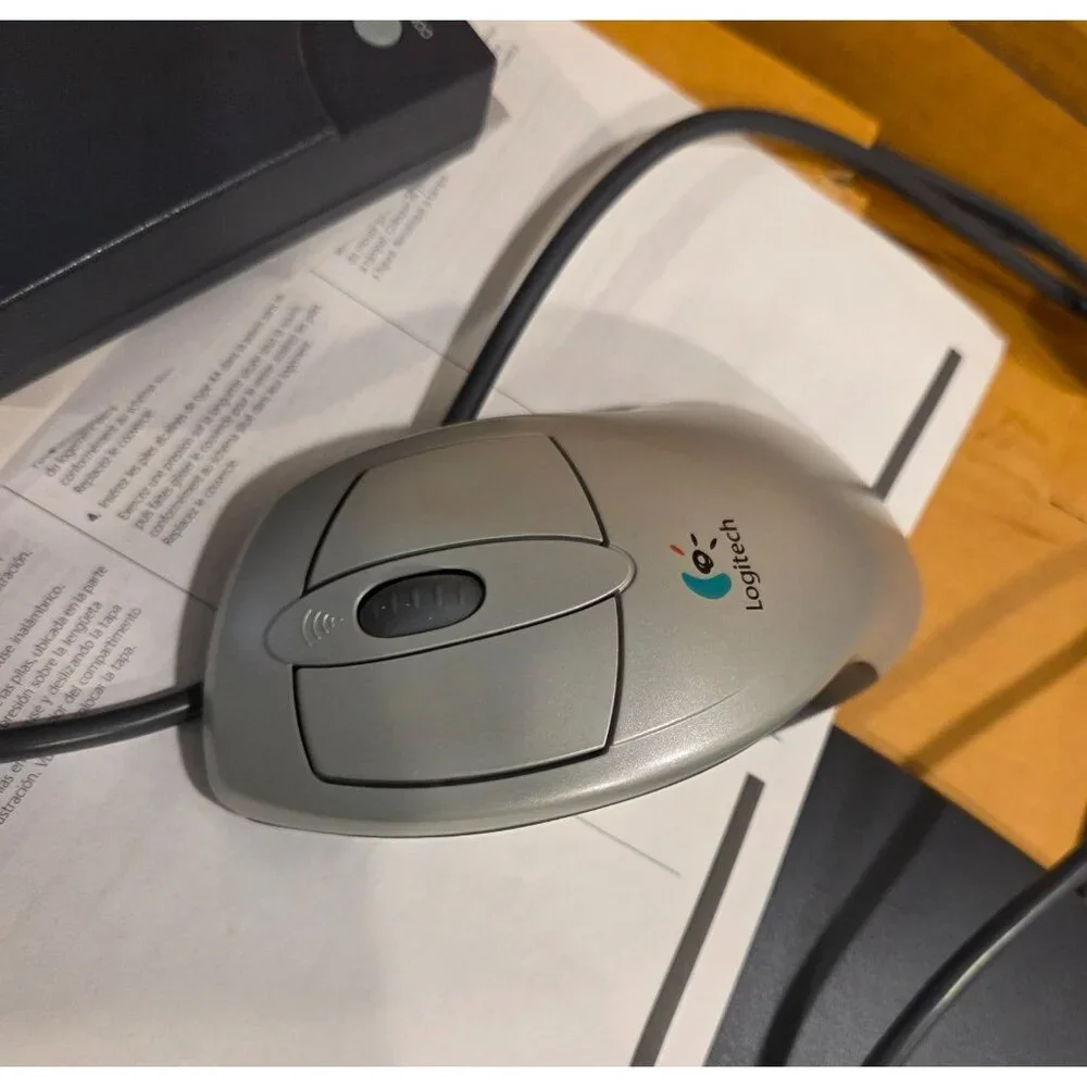 Logitech Cordless Freedom Navigator Keyboard Wheel Mouse Receiver User Guide